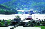 The lock gates at Miraflores are the tallest in the system because of the extreme tidal variation in the Pacific Ocean